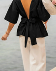 Blouse noir dos ouvert avec noeud AU DOS