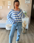 Pull carreau ouvert au dos