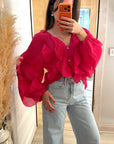 Chemise fushia à froufrou fluide