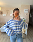 Pull carreau ouvert au dos